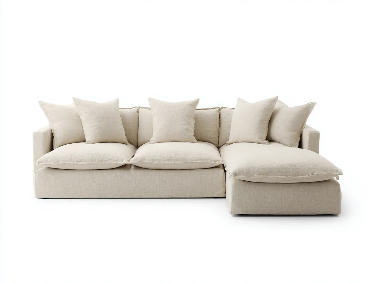 Divano angolare in tessuto 286×172×76 cm - crema - chaise integrata